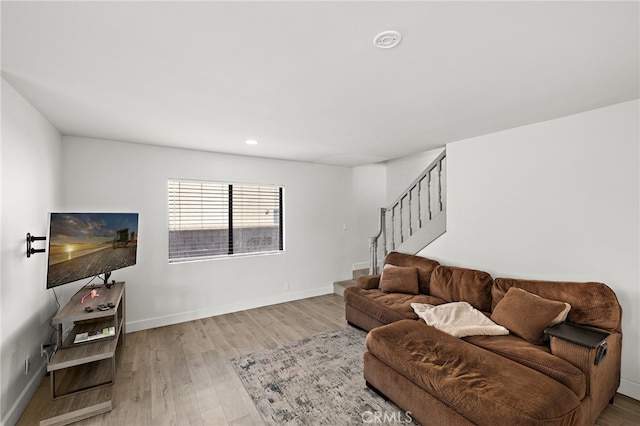 4292 Howard Ave, Los Alamitos, CA 90720 - living area with wood finished floors, stairs, and recessed lighting