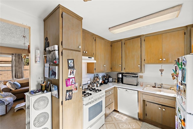 4292 Howard Ave, Los Alamitos, CA 90720 - kitchen featuring white appliances, under cabinet range hood, and light countertops
