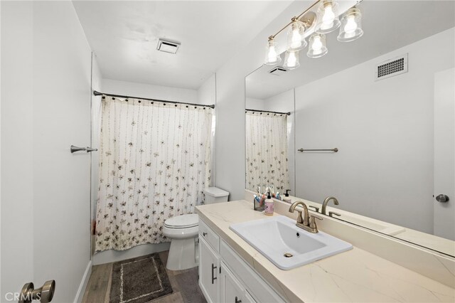 4292 Howard Ave, Los Alamitos, CA 90720 - full bath with vanity, wood finished floors, and curtained shower