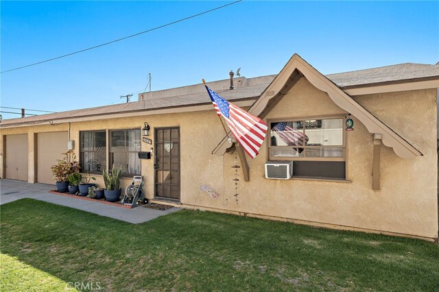 4292 Howard Ave, Los Alamitos, CA 90720 - view of front facade featuring stucco siding and a front lawn