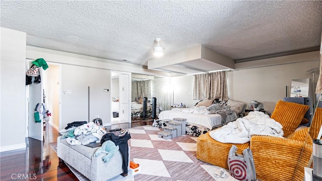 3375 Fuchsia, Costa Mesa, CA 92626 - bedroom featuring wood finished floors and a textured ceiling