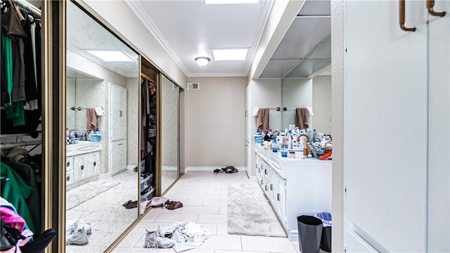 3375 Fuchsia, Costa Mesa, CA 92626 - full bathroom featuring vanity, a walk in closet, ornamental molding, and tile patterned floors