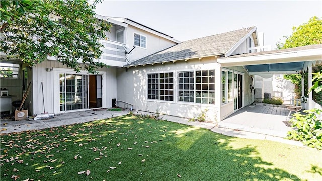 3375 Fuchsia, Costa Mesa, CA 92626 - back of property featuring a lawn, a patio area, and roof with shingles