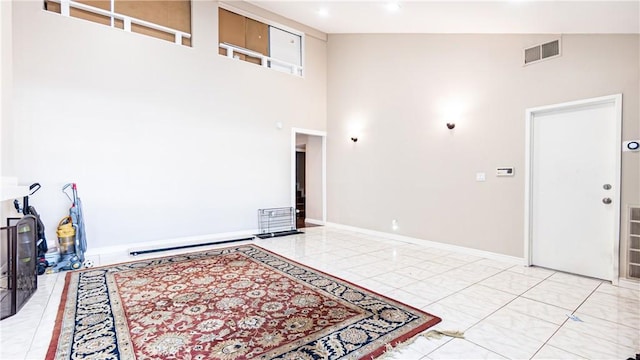3375 Fuchsia, Costa Mesa, CA 92626 - unfurnished room with baseboards and a high ceiling