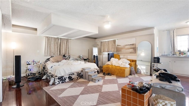 3375 Fuchsia, Costa Mesa, CA 92626 - bedroom with a textured ceiling and wood-type flooring