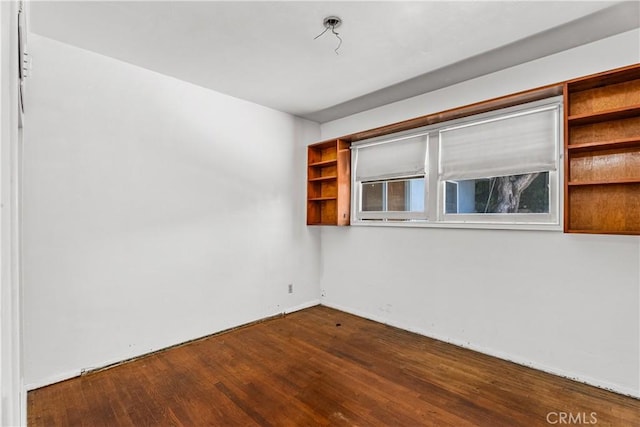 1920 Faust Ave, Long Beach, CA 90815 - empty room with dark wood-type flooring and baseboards