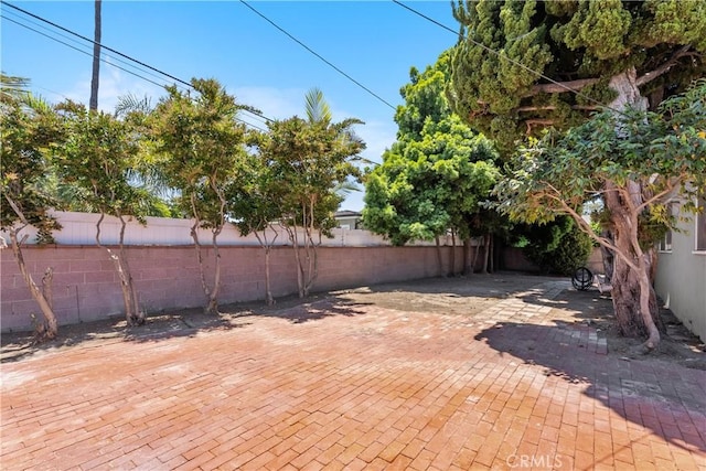 1920 Faust Ave, Long Beach, CA 90815 - fenced backyard featuring a patio area
