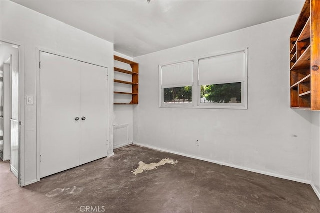 1920 Faust Ave, Long Beach, CA 90815 - unfurnished bedroom featuring unfinished concrete floors and a closet