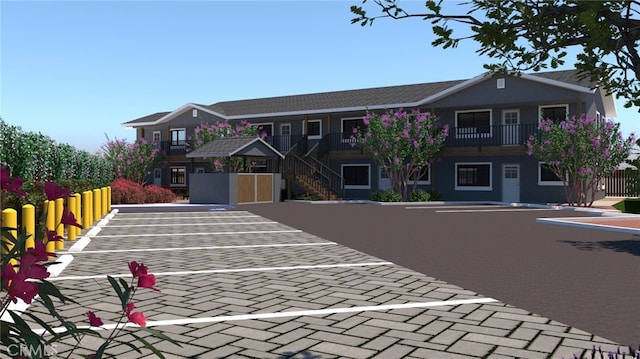 6855 Atascadero Ave, Atascadero, CA 93422 - view of front facade featuring stairs and a balcony