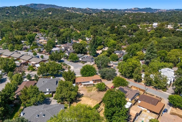 6855 Atascadero Ave, Atascadero, CA 93422 - aerial view of residential area with a mountainous background and a heavily wooded area
