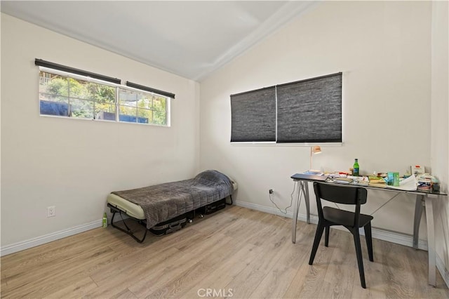12616 Terra Bella St, Pacoima, CA 91331 - bedroom featuring vaulted ceiling and light wood-type flooring
