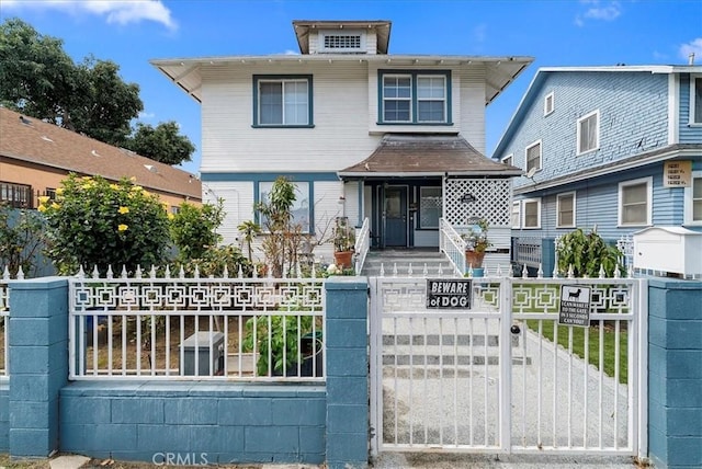 1665 Arlington Ave, Los Angeles, CA 90019 - traditional style home with a fenced front yard, covered porch, and a gate