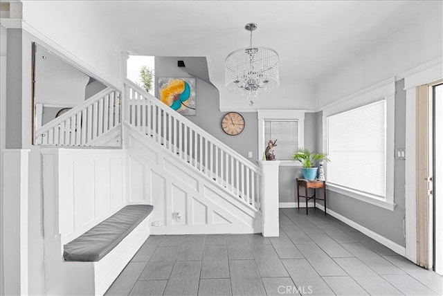 1665 Arlington Ave, Los Angeles, CA 90019 - foyer entrance with a chandelier and stairway