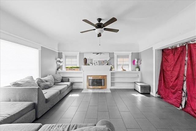 1665 Arlington Ave, Los Angeles, CA 90019 - living area with a ceiling fan and healthy amount of natural light