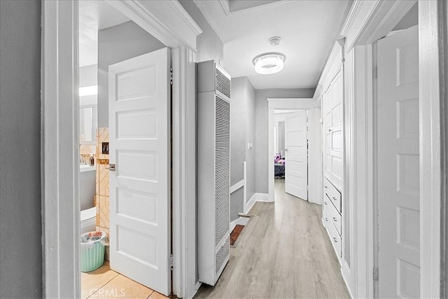 1665 Arlington Ave, Los Angeles, CA 90019 - hall with a heating unit and light wood-type flooring