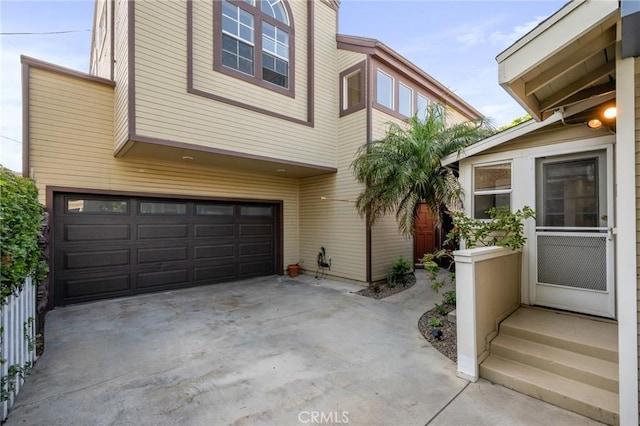 533 Roswell Ave, Long Beach, CA 90814 - view of front of property with an attached garage and driveway