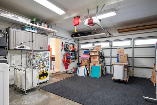533 Roswell Ave, Long Beach, CA 90814 - garage featuring a garage door opener and washer / clothes dryer