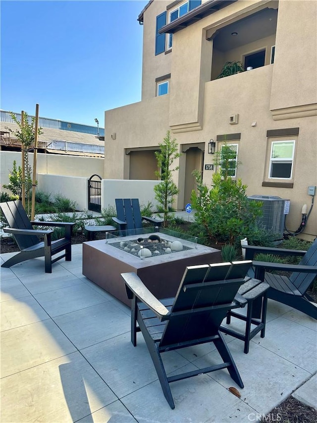 1702 W Sycamore Dr, Compton, CA 90220 - view of patio featuring an outdoor fire pit