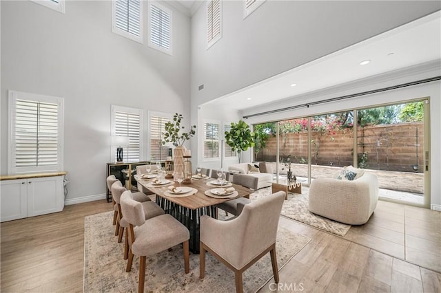 53 Interlude, Irvine, CA 92620 - dining space with light wood finished floors, ornamental molding, and a high ceiling