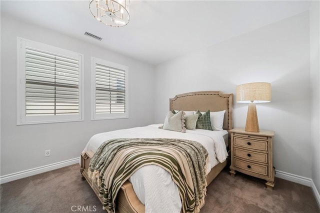 53 Interlude, Irvine, CA 92620 - bedroom featuring dark carpet and a chandelier