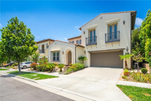 53 Interlude, Irvine, CA 92620 - mediterranean / spanish home with a balcony, french doors, an attached garage, and stucco siding