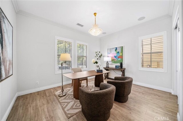 53 Interlude, Irvine, CA 92620 - home office featuring light wood-type flooring, crown molding, and a chandelier