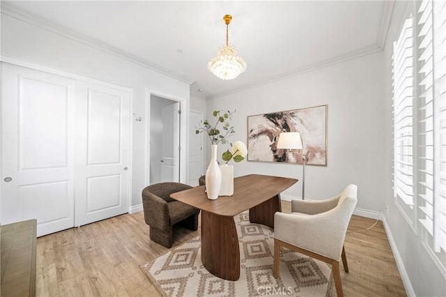 53 Interlude, Irvine, CA 92620 - dining space with healthy amount of natural light, light wood-type flooring, crown molding, and a chandelier