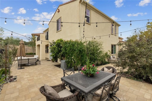 24912 Hearth Ct, Valencia, CA 91354 - view of patio / terrace featuring outdoor dining area and an outdoor living space