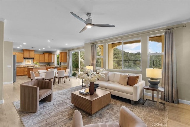 24912 Hearth Ct, Valencia, CA 91354 - living area with light wood-style floors, ceiling fan, and recessed lighting