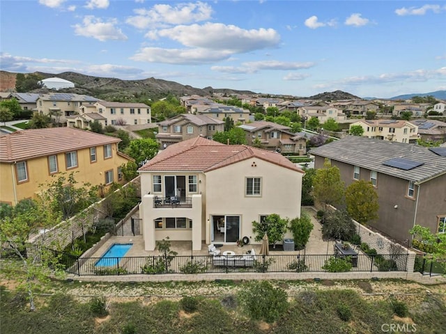 24912 Hearth Ct, Valencia, CA 91354 - back of property featuring a balcony, a residential view, a fenced backyard, and a patio area