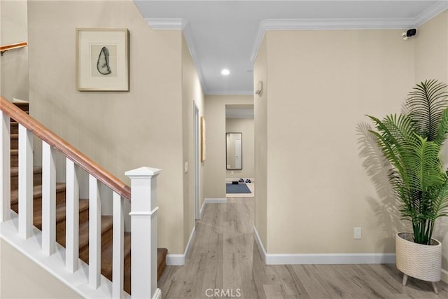 24912 Hearth Ct, Valencia, CA 91354 - hallway featuring wood finished floors, crown molding, and recessed lighting