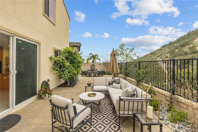 24912 Hearth Ct, Valencia, CA 91354 - fenced backyard with an outdoor living space, a patio area, and a mountain view