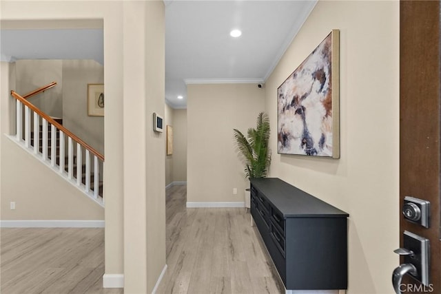 24912 Hearth Ct, Valencia, CA 91354 - hallway with light wood-style floors, ornamental molding, and recessed lighting