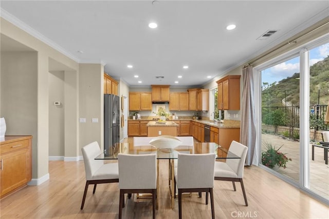 24912 Hearth Ct, Valencia, CA 91354 - dining room featuring crown molding, light wood-style flooring, and recessed lighting