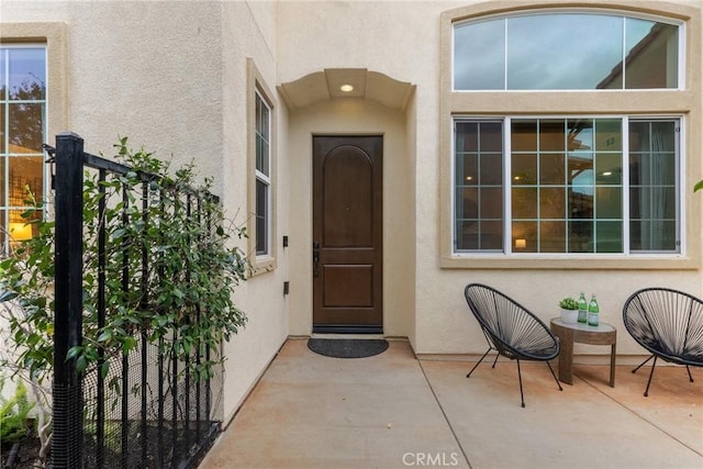 24912 Hearth Ct, Valencia, CA 91354 - view of exterior entry with stucco siding