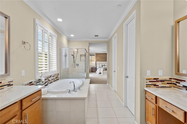 24912 Hearth Ct, Valencia, CA 91354 - full bathroom featuring a shower stall, crown molding, a garden tub, vanity, and tile patterned flooring