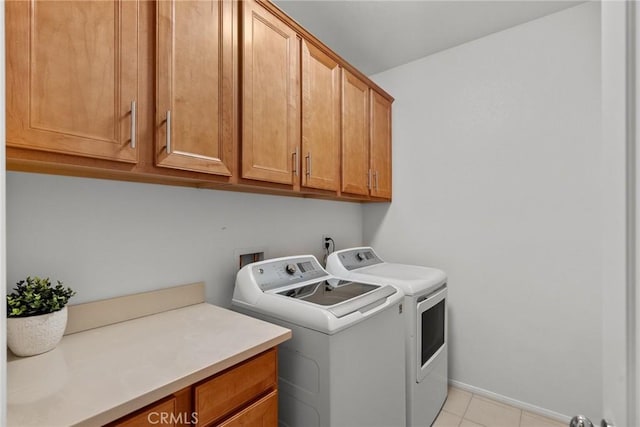 24912 Hearth Ct, Valencia, CA 91354 - laundry room with separate washer and dryer, cabinet space, and light tile patterned floors