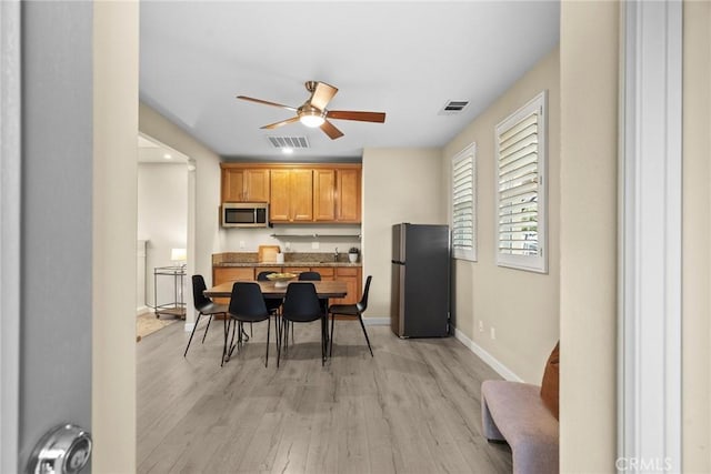 24912 Hearth Ct, Valencia, CA 91354 - dining space featuring ceiling fan, light wood-style flooring, and recessed lighting