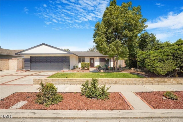 429 Walter Ave, Newbury Park, CA 91320 - ranch-style home featuring a garage, concrete driveway, stucco siding, and a front lawn