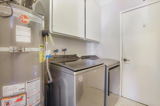 429 Walter Ave, Newbury Park, CA 91320 - washroom with secured water heater, washing machine and dryer, cabinet space, and light tile patterned flooring