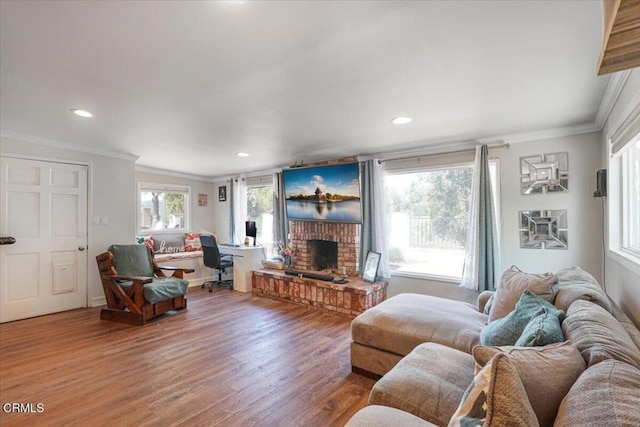 429 Walter Ave, Newbury Park, CA 91320 - living area with ornamental molding, a brick fireplace, wood finished floors, recessed lighting, and an office area
