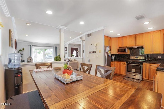 429 Walter Ave, Newbury Park, CA 91320 - dining area with ornate columns, crown molding, recessed lighting, and wood finished floors