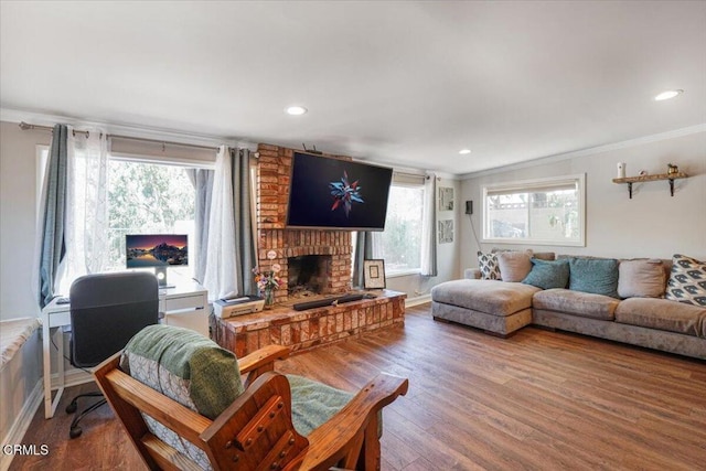 429 Walter Ave, Newbury Park, CA 91320 - living area with crown molding, wood finished floors, a fireplace, and recessed lighting