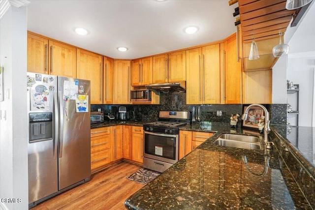 429 Walter Ave, Newbury Park, CA 91320 - kitchen featuring appliances with stainless steel finishes, light wood-type flooring, backsplash, extractor fan, and recessed lighting