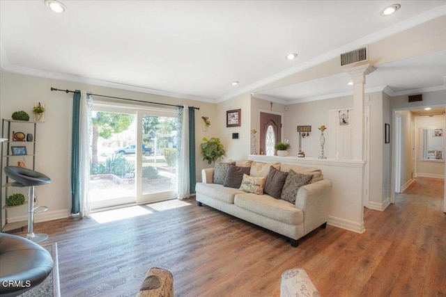 429 Walter Ave, Newbury Park, CA 91320 - living area with light wood-type flooring, ornate columns, recessed lighting, and crown molding