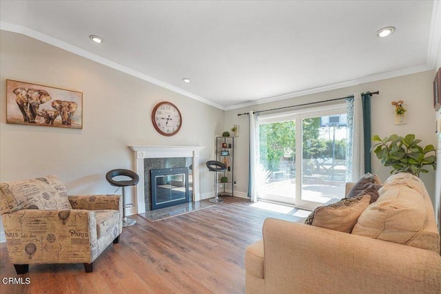 429 Walter Ave, Newbury Park, CA 91320 - living area with wood finished floors, ornamental molding, a fireplace, and recessed lighting