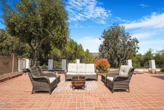 429 Walter Ave, Newbury Park, CA 91320 - view of patio / terrace with an outdoor living space with a fire pit