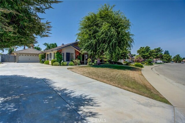 9425 Oak Hills Ave, Bakersfield, CA 93312 - view of front of property featuring concrete driveway and an attached garage