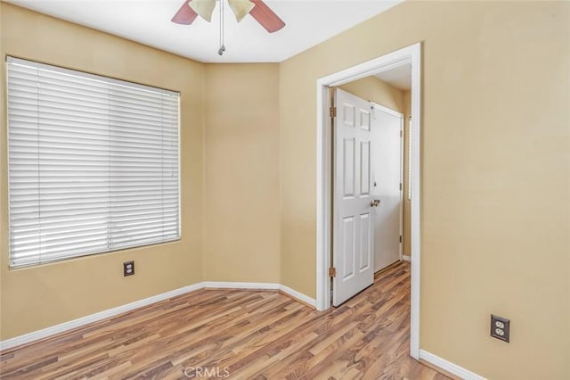 9425 Oak Hills Ave, Bakersfield, CA 93312 - empty room with light wood-style flooring and ceiling fan