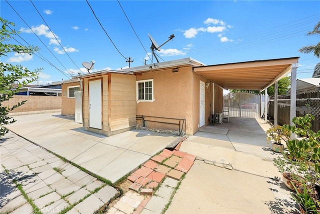 13162 Oaks Ave, Chino, CA 91710 - rear view of house featuring a gate
